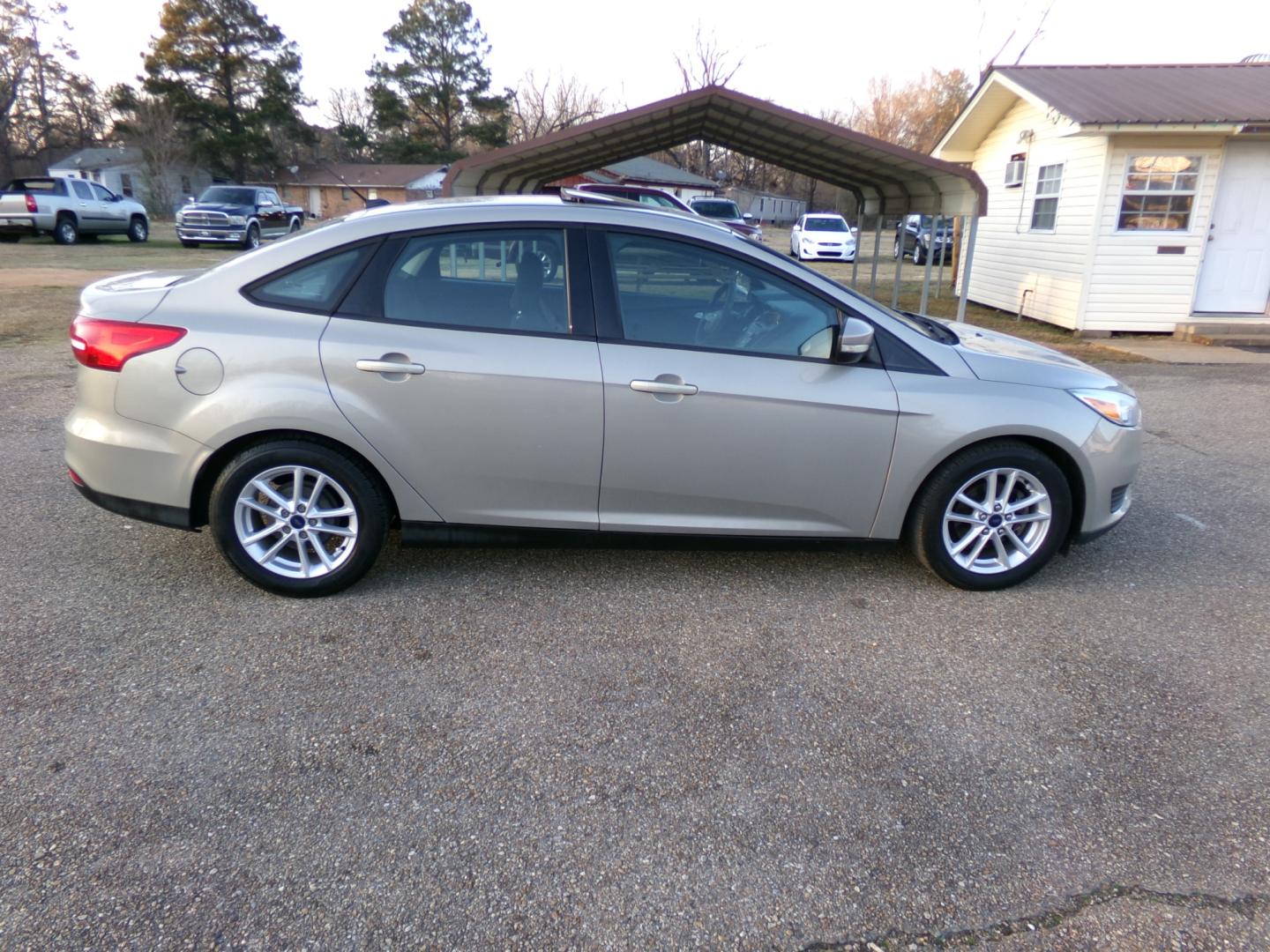 2015 Tectonic Silver Metallic /Black Ford Focus (1FADP3F23FL) , located at 401 First NE, Bearden, AR, 71720, (870) 687-3414, 33.726528, -92.611519 - Photo#21